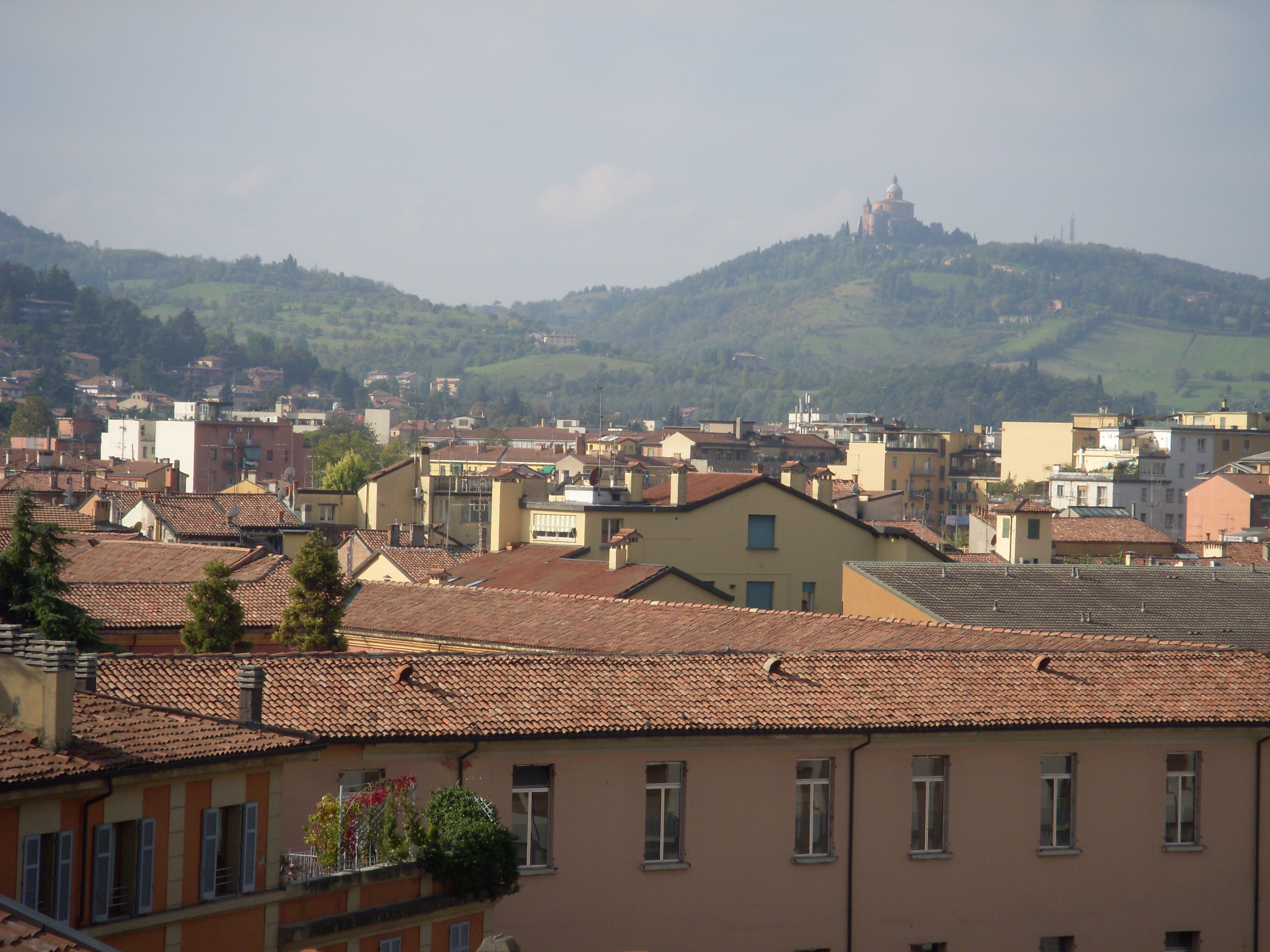 View from the balcony with Santuario San Luca on the hilltop